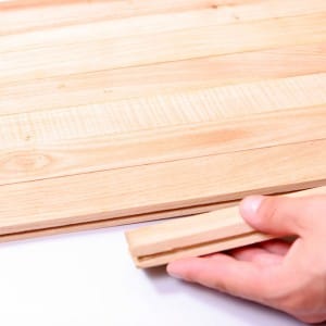 Person fitting wooden floor